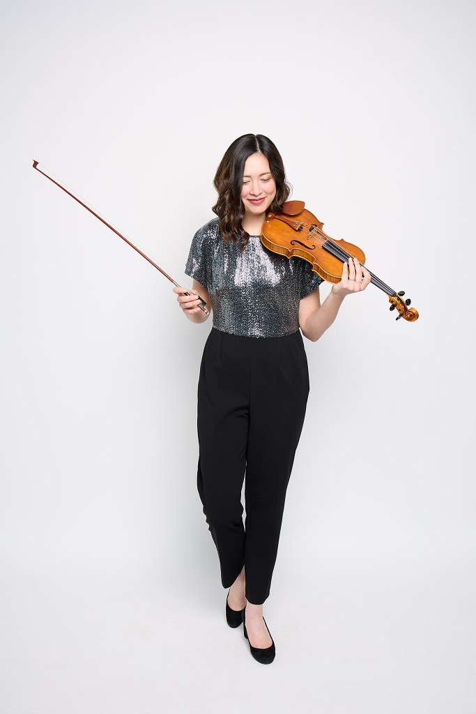 Naomi Garrett plays her violin. Prince Edward County, Belleville, Quinte, Hastings violinist for weddings, events and music lessons.